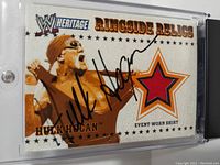 Front of the 2005 Topps WWE Heritage Ringside Relics Hulk Hogan card showing signed autograph and red star patch