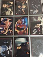Six trading cards arranged in two rows, featuring scenes and characters from The Crow movie including Brandon Lee.