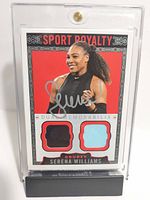 Front of the trading card with Serena Williams photo, autograph, and dual memorabilia patches.