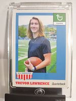 Front of the 2021 Topps Trevor Lawrence rookie card showing portrait, blue border, and text.