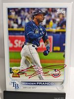 Front of the signed Wander Franco 2022 Topps rookie card showing player image, autograph, and team logo.