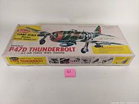 Top view of the box showing Guillow's Giant Scale Balsa Model Kit P-47D Thunderbolt with detailed aircraft illustration.