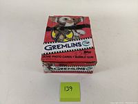 Closed outer box with Gremlins theme and Topps branding.