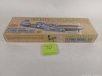 Top view of sealed Guillow's Curtiss P-40 Warhawk model kit box with vintage graphics and 16 1/2 inch wingspan noted.