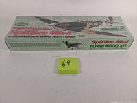 Top view of the sealed box showing the full name Guillow's Supermarine Spitfire MK1, wingspan, and 1976 date.