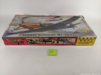 Front view of the vintage MPC Messerschmitt Bf-109E model kit box showing box art featuring the fighter plane in flight.
