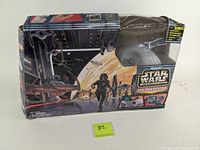 Photo of the vintage Star Wars Micro Machines Death Star play set original box, showing space battle artwork and packaging detail.