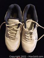 Top view showing the white leather upper with laces and padded ankle area of the vintage Nike Air golf shoes.