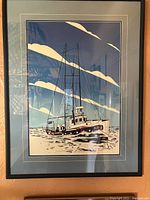 Framed print showing full artwork, double mat and black frame