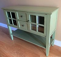 Three-quarter front view showing left side of sideboard