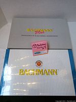 Boxed Bachmann Plus lot with outer packaging and catalog.