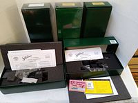 Five Spectrum boxes (three closed, two open) displayed to show original packaging and quantity.