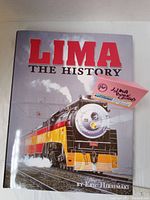 Full front cover of the book showing title, locomotive image, and author