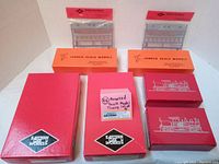 Overall lot of 8 vintage model kits boxes from Eastern Car Works, Keystone Locomotive Works, and Juneco Scale Models, showing packaging and quantity.