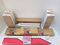 Lot of 10 boxed model train cars from LaBelle, Quality Craft Models, and InterMountain Railway Company, arranged for display