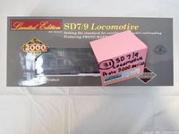 Photo showing two boxed PROTO 2000 Series SD7/9 HO scale locomotive models in Limited Edition packaging with visible branding and model information.