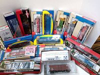 All items arranged in cardboard backdrop showing variety of boxes