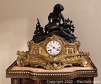 Overall view of salon clock showing patinated bronze figure and gilt metal base