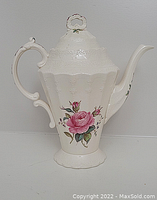 Front view of the Spode coffee pot showing the floral design and handle.