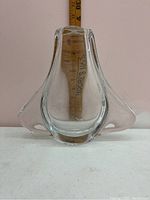 Front view of the clear glass vase with a measuring ruler showing height and width.