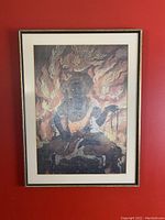 Framed artwork of Blue Fudo Myo-o Acala hung against red wall, showing full front view.