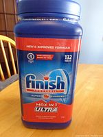 Photo of the blue and red labeled Finish Powerball container showing product details and tablet quantity marking 132 tablets on front (original count).