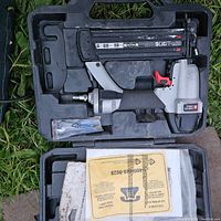 Full view of the 2 inch brad nailer in its carrying case with manuals and accessories included.