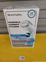 Front view of the Beautural Handheld Garment Steamer box showing product image and key features such as 30 seconds fast heat-up time and powerful steam.