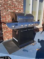 Front view of Master Chef gas grill on patio