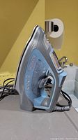 Photo of Black & Decker electric iron showing side view with dial and cord
