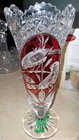 Full view of vintage Hofbaur Byrds vase showing cut crystal design with red overlay and bird engravings