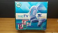 Box front of LeapFrog LeapTV showing product and branding.