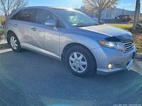 Front-left side view of silver Toyota Venza showing exterior condition
