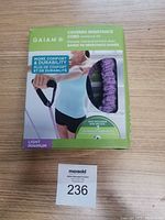 Photo of the Gaiam Covered Resistance Cord workout kit box showing product image and details with damaged packaging.
