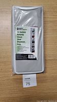 New packaged Simple Houseware 10 Shelves Hanging Closet Shoe Organizer in grey fabric, showing front label and product information.