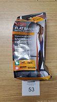 Photo of the front of the SPRI Flat Band Kit packaging with usage information and resistance level indication