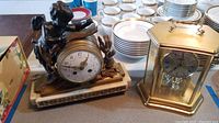 Overview of both clocks side by side on table