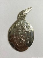 Front view of brooch on white background