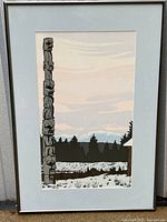 Full view of framed print showing totem pole and landscape.
