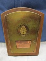 Front view of the wooden and brass military plaque with Canadian Forces emblem and championship engraving.
