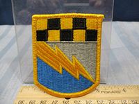 Close-up image of the 525th Expeditionary Military Intelligence patch showing details and colors.