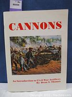 Front cover of the book titled 'Cannons: An Introduction to Civil War Artillery' with a historical battle illustration.