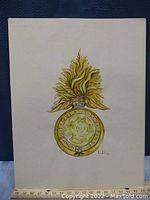Artwork of a signed cap badge with ruler showing approximately 7x9 inches