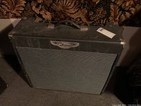 Front view of Traynor combo amplifier showing black tolex and silver grille