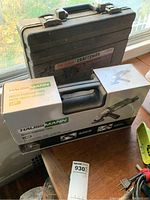 Haussmann tool in box and Craftsman accessory case together