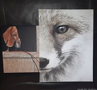 Photo showing the two canvas prints side-by-side: a hound dog looking sideways with reddish-brown fur, and a close-up image of a fox's face focusing on the eye and snout with detailed fur rendering.