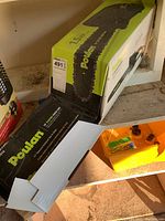 Poulan 14 inch electric chainsaw boxed with visible branding and size details
