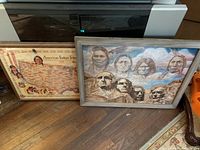 Photo of two framed Indian art pieces side by side showing the puzzle and the map.