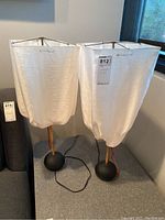 Two lamps side by side on table showing overall appearance and proportions