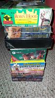 Photo of stacked trading card display boxes including Robin Hood Prince of Thieves, James Bond 007, Alien 3, Star Trek The Next Generation, An American Tail Fievel Goes West